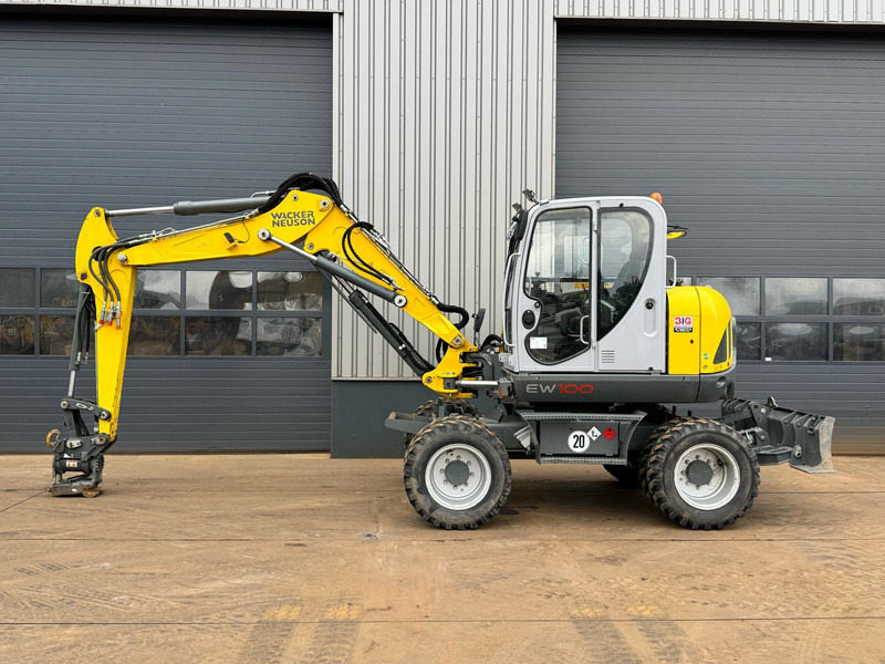 WACKER NEUSON EW100 E06-03 - Riteņu ekskavators: foto 1 WACKER NEUSON EW100 E06-03 - Riteņu ekskavators: foto 1