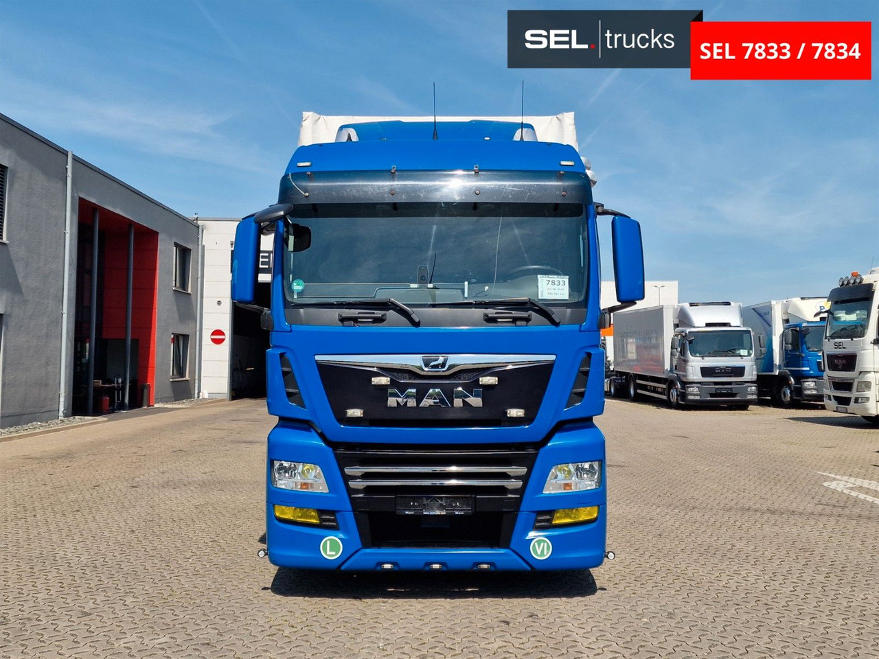 MAN TGX 18.500 4X2 LL-U / Intarder/Durchlade/Hubdach - Kravas automašīna ar tentu: foto 2 MAN TGX 18.500 4X2 LL-U / Intarder/Durchlade/Hubdach - Kravas automašīna ar tentu: foto 2