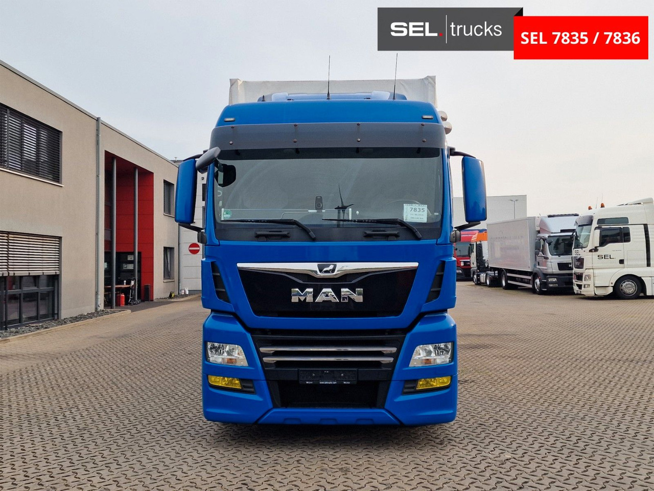 MAN TGX 18.500 4x2 LL-U/ Intarder/Durchlade/Hubdach - Kravas automašīna ar tentu: foto 2 MAN TGX 18.500 4x2 LL-U/ Intarder/Durchlade/Hubdach - Kravas automašīna ar tentu: foto 2