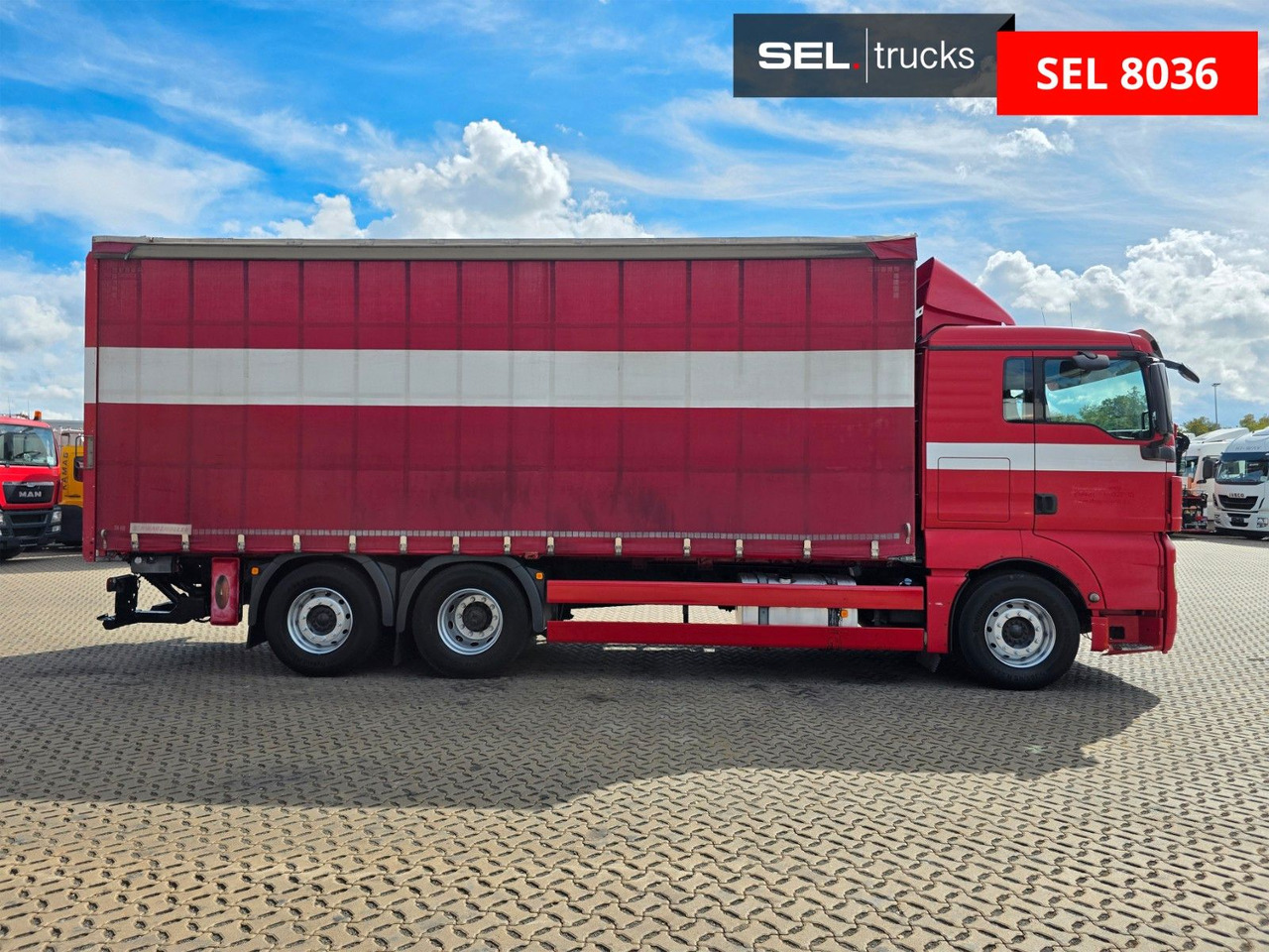 MAN TGX 26.360 6X2-2 LL / Intarder / Ldbw /Lenkachse - Kravas automašīna ar tentu: foto 4 MAN TGX 26.360 6X2-2 LL / Intarder / Ldbw /Lenkachse - Kravas automašīna ar tentu: foto 4