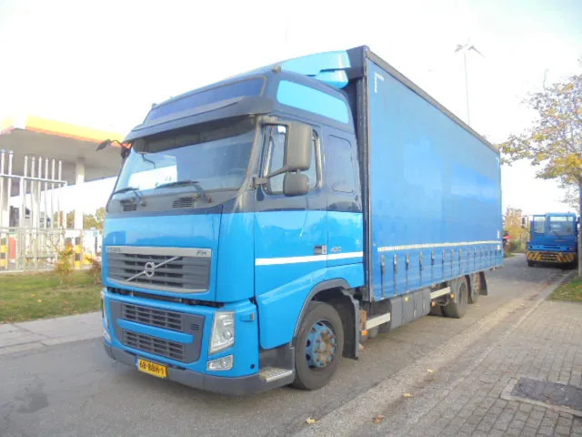 Volvo FH 420 6X2 NL TRUCK - Kravas automašīna ar tentu: foto 1 Volvo FH 420 6X2 NL TRUCK - Kravas automašīna ar tentu: foto 1