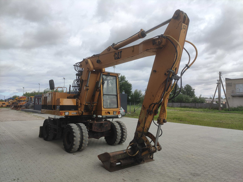 Caterpillar 214 B wheel excavator - Riteņu ekskavators: foto 3 Caterpillar 214 B wheel excavator - Riteņu ekskavators: foto 3
