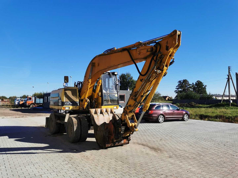 Caterpillar M315 wheel excavator - Riteņu ekskavators: foto 4 Caterpillar M315 wheel excavator - Riteņu ekskavators: foto 4