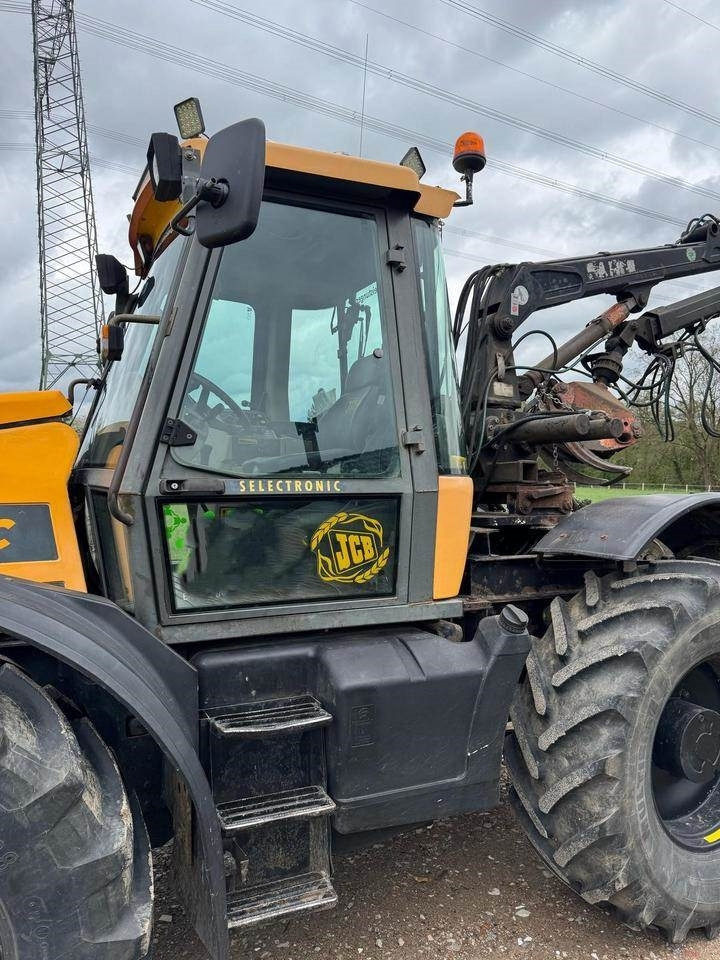 JCB Fastrac 1115 - Traktors: foto 4 JCB Fastrac 1115 - Traktors: foto 4