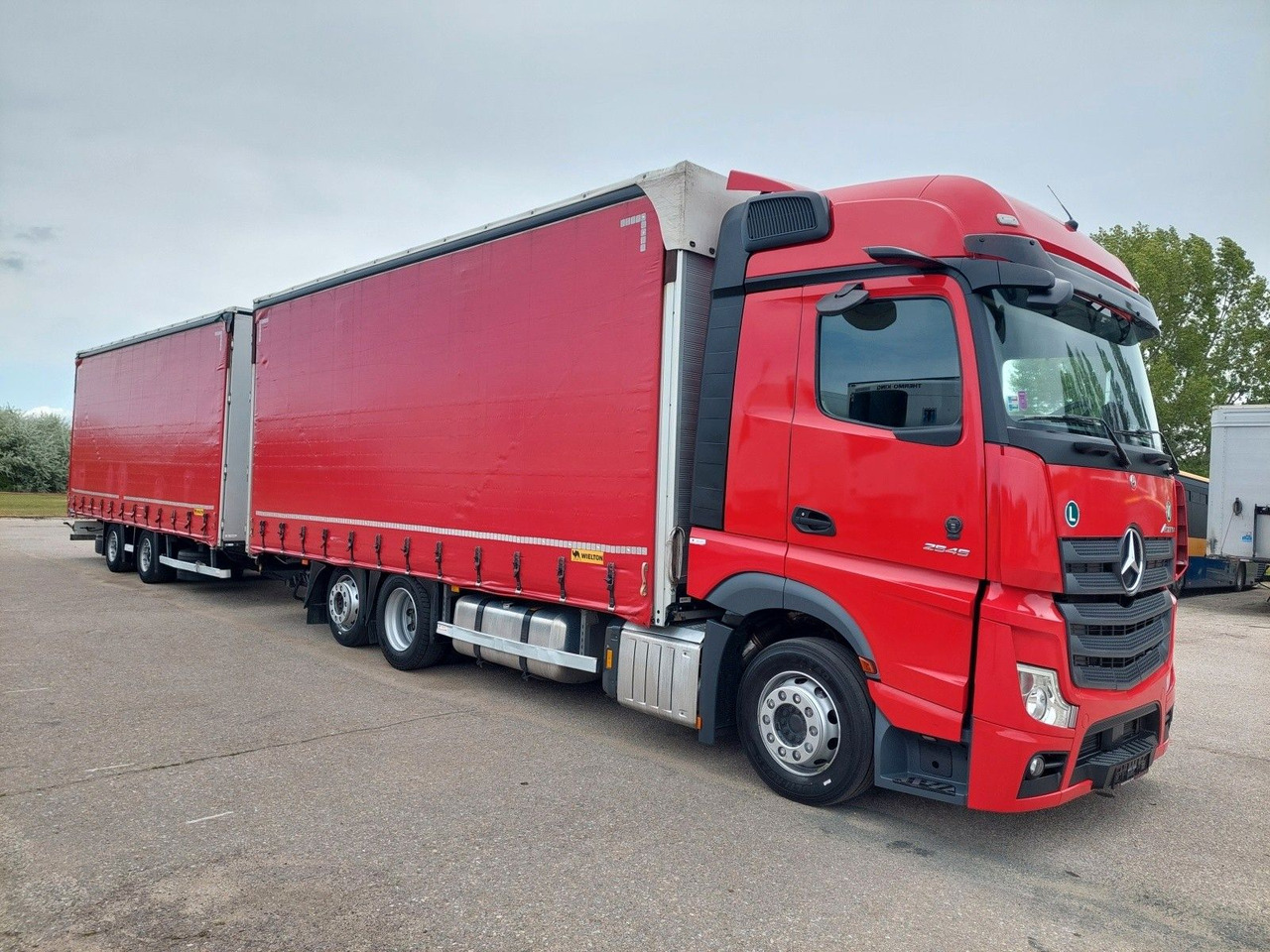 Mercedes-Benz Actros 2545 L/NR 6x2 + Wielton PC2K Durchbar - Kravas automašīna ar tentu: foto 2 Mercedes-Benz Actros 2545 L/NR 6x2 + Wielton PC2K Durchbar - Kravas automašīna ar tentu: foto 2