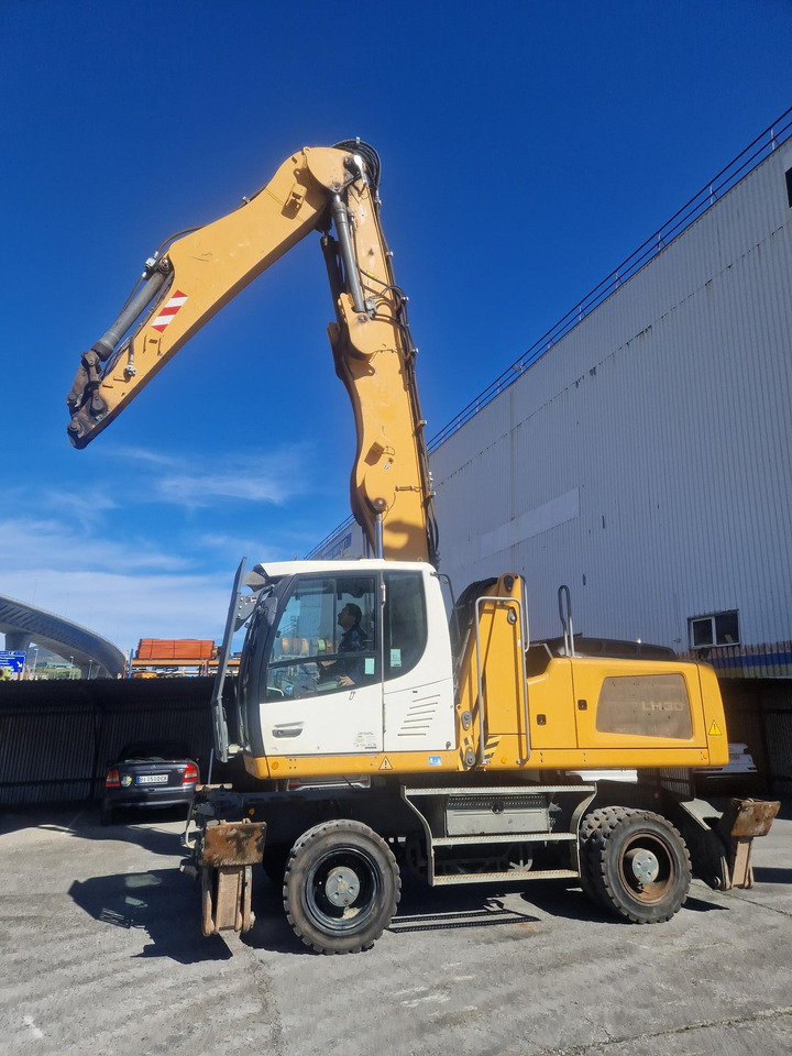 LIEBHERR LH30M - Atkritumu iekrāvējs: foto 1 LIEBHERR LH30M - Atkritumu iekrāvējs: foto 1