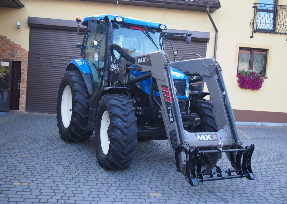 Ciągnik New Holland NH T6.140 2016 New Holland z Ładowaczem czołowym TUR - Traktors: foto 5 Ciągnik New Holland NH T6.140 2016 New Holland z Ładowaczem czołowym TUR - Traktors: foto 5