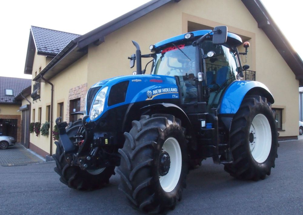 Ciągnik New Holland T7.185 2013 New Holland Autocommand i TUZ - Traktors: foto 1 Ciągnik New Holland T7.185 2013 New Holland Autocommand i TUZ - Traktors: foto 1
