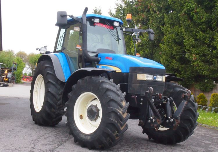 Ciągnik New Holland TM 140 2004 Przedni TUZ - Traktors: foto 2 Ciągnik New Holland TM 140 2004 Przedni TUZ - Traktors: foto 2