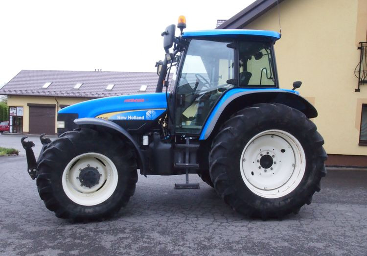 Ciągnik New Holland TM 140 2004 Przedni TUZ - Traktors: foto 5 Ciągnik New Holland TM 140 2004 Przedni TUZ - Traktors: foto 5