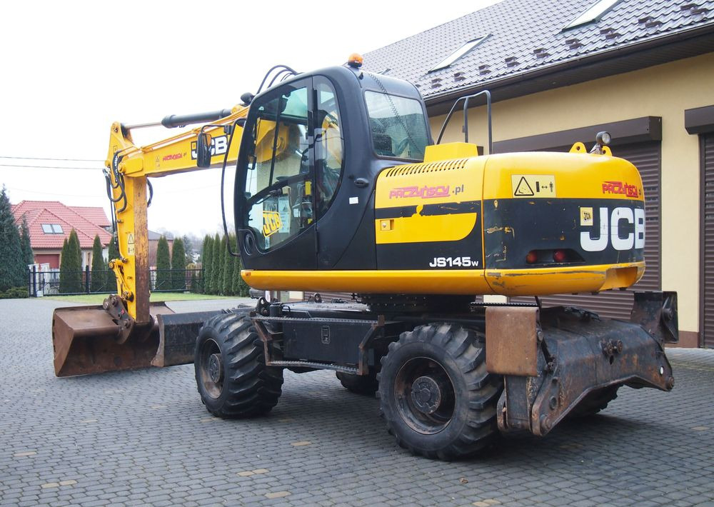 Koparka kołowa JCB JS145W 2011 Koparka JCB - Riteņu ekskavators: foto 5 Koparka kołowa JCB JS145W 2011 Koparka JCB - Riteņu ekskavators: foto 5