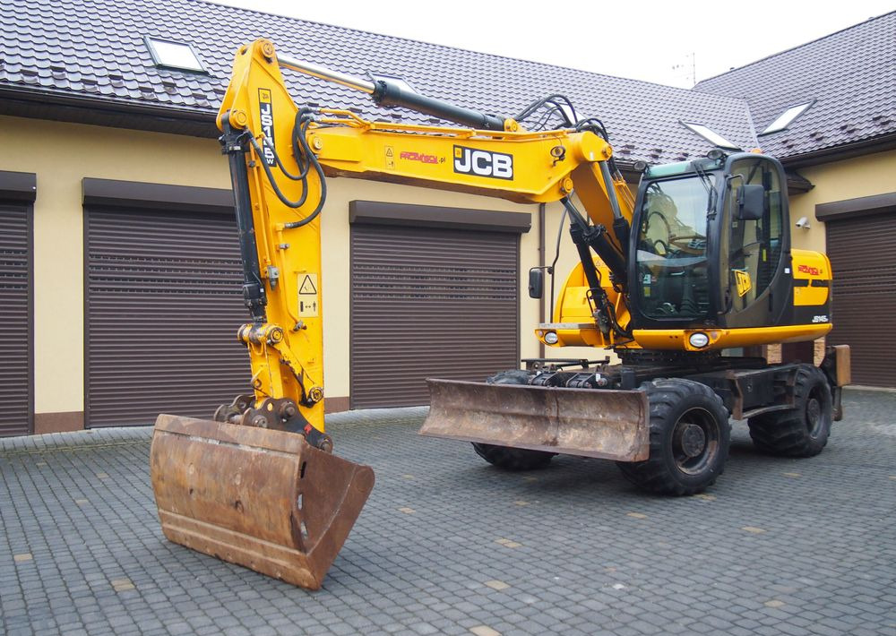 Koparka kołowa JCB JS145W 2011 Koparka JCB - Riteņu ekskavators: foto 3 Koparka kołowa JCB JS145W 2011 Koparka JCB - Riteņu ekskavators: foto 3