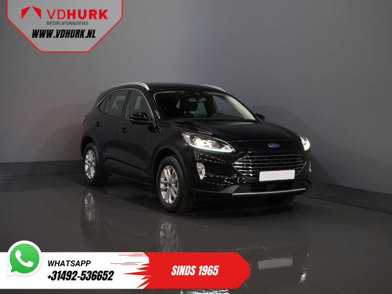Ford Kuga 2.5 PHEV 225 pk Titanium Navi/ Carplay/ Stoelverw./ Stuurverw./ Camera/ PDC/ Climate - SUV: foto 1 Ford Kuga 2.5 PHEV 225 pk Titanium Navi/ Carplay/ Stoelverw./ Stuurverw./ Camera/ PDC/ Climate - SUV: foto 1