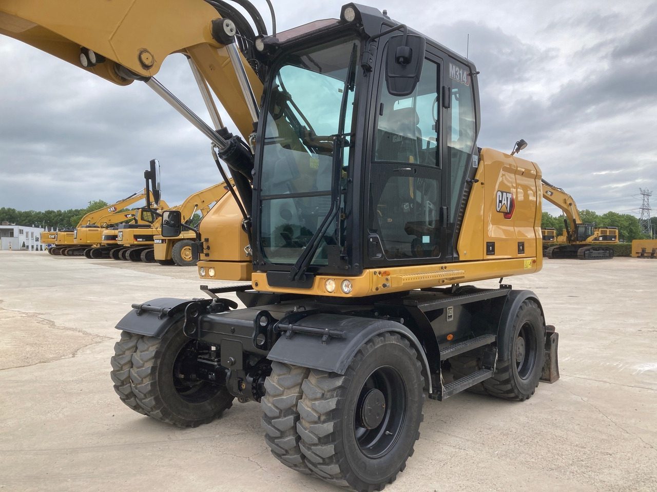 CATERPILLAR M314 - Riteņu ekskavators: foto 2 CATERPILLAR M314 - Riteņu ekskavators: foto 2