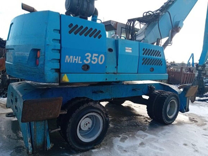 Fuchs MHL350 - Atkritumu iekrāvējs: foto 4 Fuchs MHL350 - Atkritumu iekrāvējs: foto 4