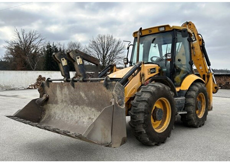 JCB 4 CX - Ekskavators-iekrāvējs: foto 1 JCB 4 CX - Ekskavators-iekrāvējs: foto 1