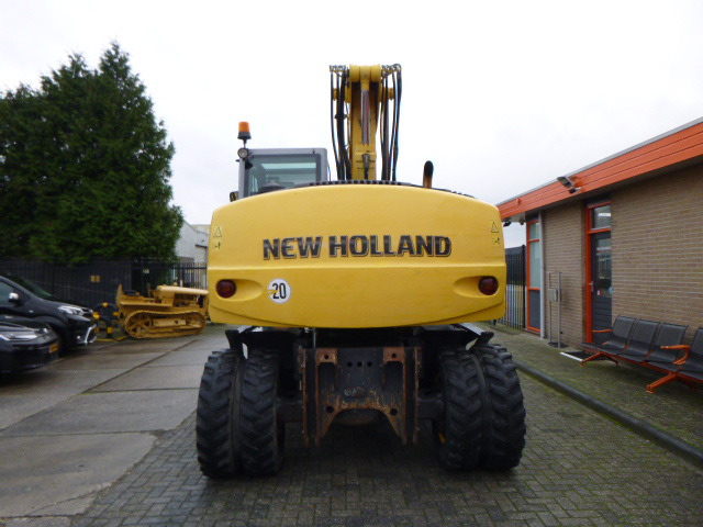 NEW HOLLAND MH PLUS - Riteņu ekskavators: foto 4 NEW HOLLAND MH PLUS - Riteņu ekskavators: foto 4