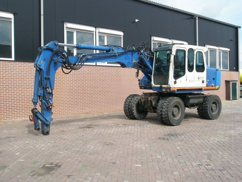 Atlas 1404 - Riteņu ekskavators: foto 1 Atlas 1404 - Riteņu ekskavators: foto 1