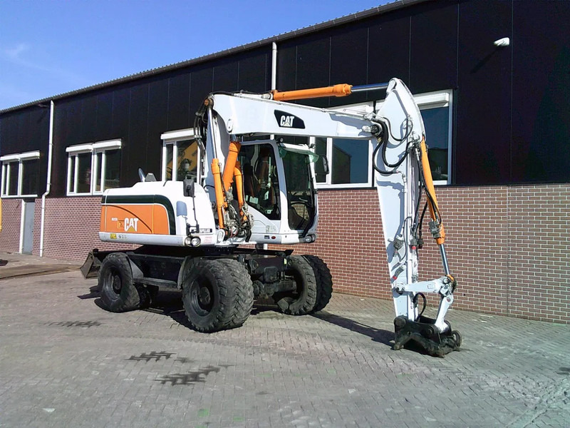 Caterpillar M313D - Riteņu ekskavators: foto 3 Caterpillar M313D - Riteņu ekskavators: foto 3