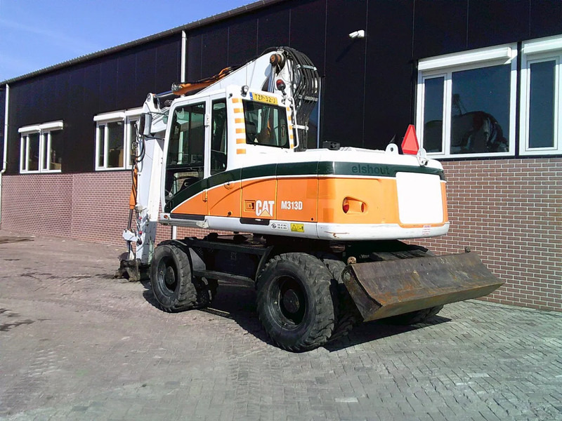 Caterpillar M313D - Riteņu ekskavators: foto 2 Caterpillar M313D - Riteņu ekskavators: foto 2