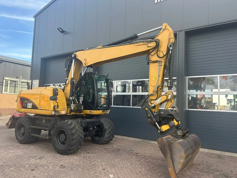 Caterpillar M313D - Riteņu ekskavators: foto 3 Caterpillar M313D - Riteņu ekskavators: foto 3