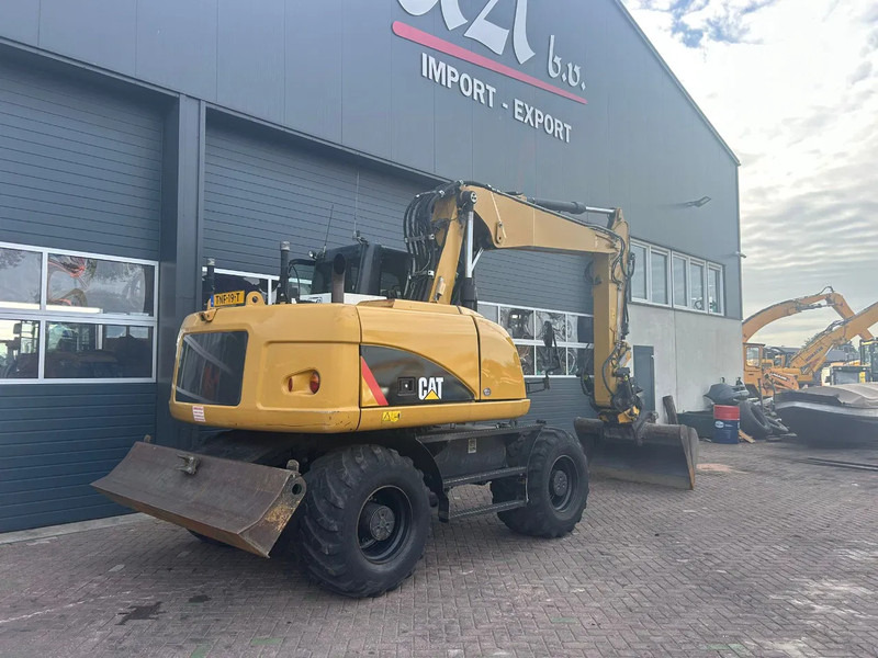 Caterpillar M313D - Riteņu ekskavators: foto 4 Caterpillar M313D - Riteņu ekskavators: foto 4