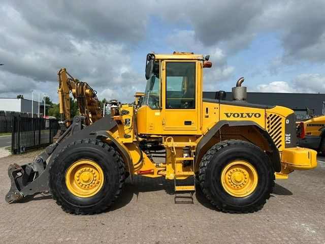 Volvo L70E - Riteņu iekrāvējs: foto 1 Volvo L70E - Riteņu iekrāvējs: foto 1