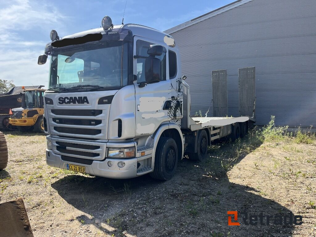 Lastbil SCANIA 8X4 Maskintransporter med Hydrauliske slidsker - Autovedējs: foto 1 Lastbil SCANIA 8X4 Maskintransporter med Hydrauliske slidsker - Autovedējs: foto 1