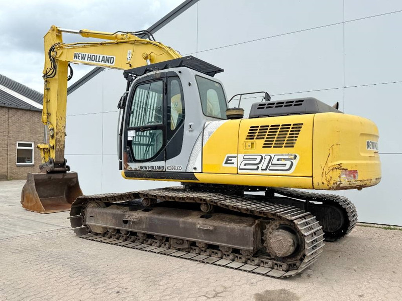 New Holland E215LC - German Machine / Hammer Lines - Kāpurķēžu ekskavators: foto 3 New Holland E215LC - German Machine / Hammer Lines - Kāpurķēžu ekskavators: foto 3