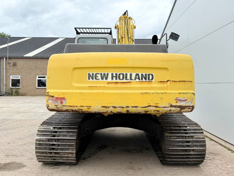 New Holland E215LC - German Machine / Hammer Lines - Kāpurķēžu ekskavators: foto 4 New Holland E215LC - German Machine / Hammer Lines - Kāpurķēžu ekskavators: foto 4