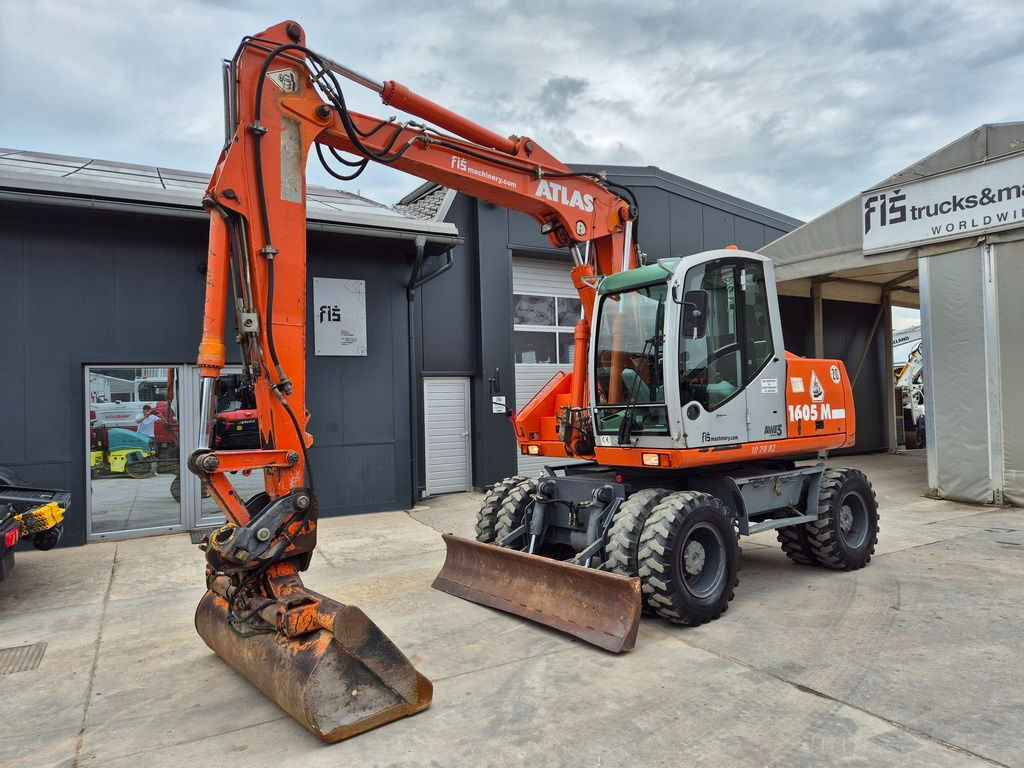 Atlas 1605 - 2005 Year - 2X Buckets - Riteņu ekskavators: foto 1 Atlas 1605 - 2005 Year - 2X Buckets - Riteņu ekskavators: foto 1
