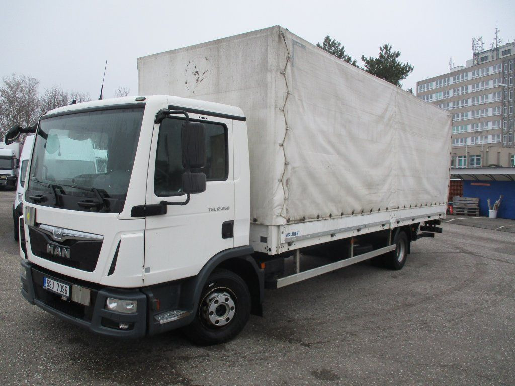 MAN TGL 12.250 - Kravas automašīna ar tentu: foto 2 MAN TGL 12.250 - Kravas automašīna ar tentu: foto 2