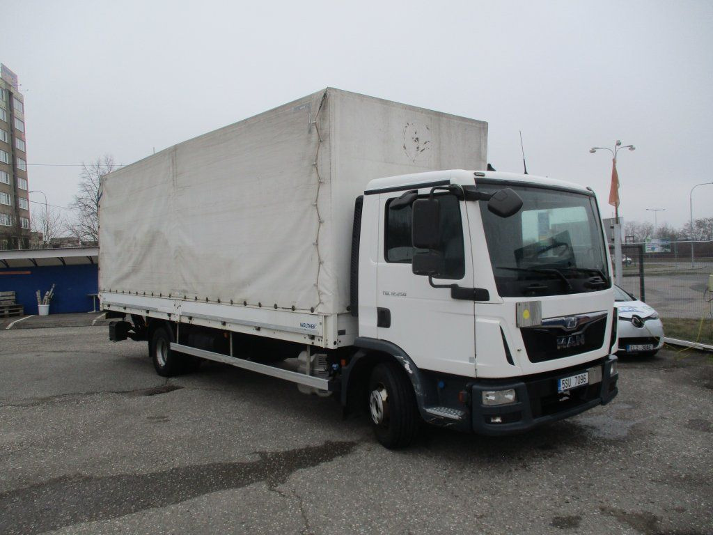 MAN TGL 12.250 - Kravas automašīna ar tentu: foto 1 MAN TGL 12.250 - Kravas automašīna ar tentu: foto 1