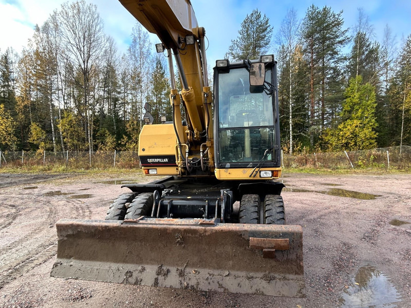 Caterpillar M312 Engcon EC20 tiltrotator - Riteņu ekskavators: foto 3 Caterpillar M312 Engcon EC20 tiltrotator - Riteņu ekskavators: foto 3