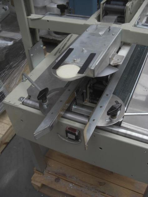 Normpack Tapemat NCG 320 automatic folding carton sealing machine - Iepakošanas mašīna: foto 2 Normpack Tapemat NCG 320 automatic folding carton sealing machine - Iepakošanas mašīna: foto 2