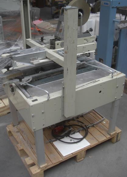 Normpack Tapemat NCG 320 automatic folding carton sealing machine - Iepakošanas mašīna: foto 3 Normpack Tapemat NCG 320 automatic folding carton sealing machine - Iepakošanas mašīna: foto 3