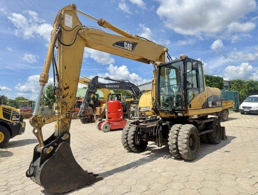 CAT M315C - Riteņu ekskavators: foto 2 CAT M315C - Riteņu ekskavators: foto 2
