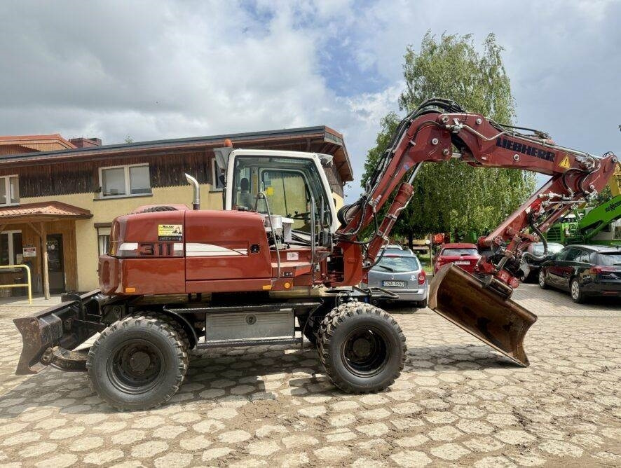 Liebherr A311 Litronic - Riteņu ekskavators: foto 1 Liebherr A311 Litronic - Riteņu ekskavators: foto 1