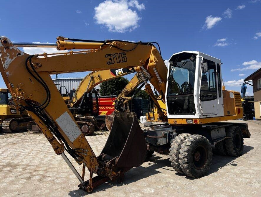 Liebherr A316 - Riteņu ekskavators: foto 1 Liebherr A316 - Riteņu ekskavators: foto 1