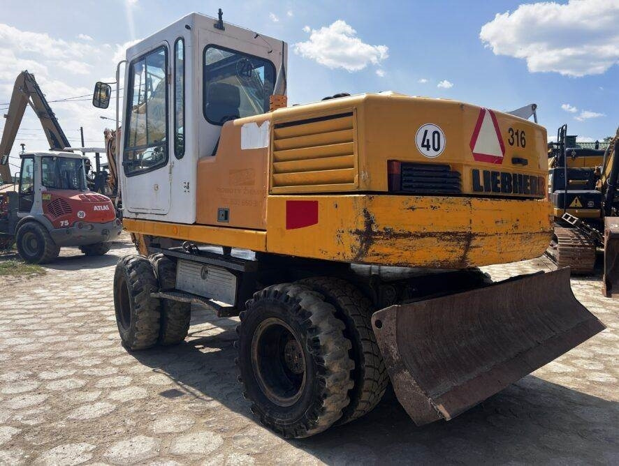 Liebherr A316 - Riteņu ekskavators: foto 3 Liebherr A316 - Riteņu ekskavators: foto 3
