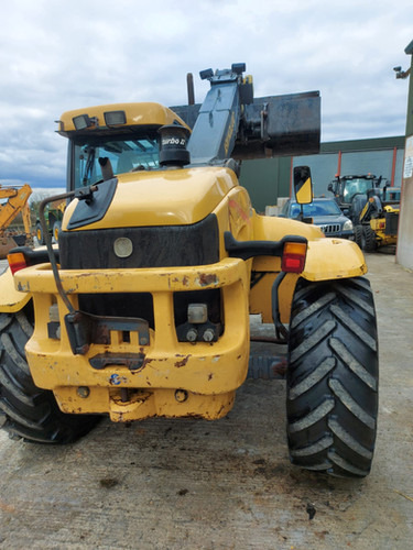 2000 New Holland LM420 - Teleskopiskais iekrāvējs: foto 5 2000 New Holland LM420 - Teleskopiskais iekrāvējs: foto 5