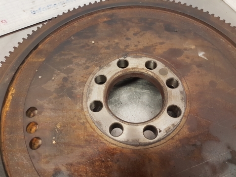 New Holland Tm190, Tm175, Case Mxm175, Mxm190 Engine Flywheel 87802598 - Spararats - Traktors: foto 4 New Holland Tm190, Tm175, Case Mxm175, Mxm190 Engine Flywheel 87802598 - Spararats - Traktors: foto 4