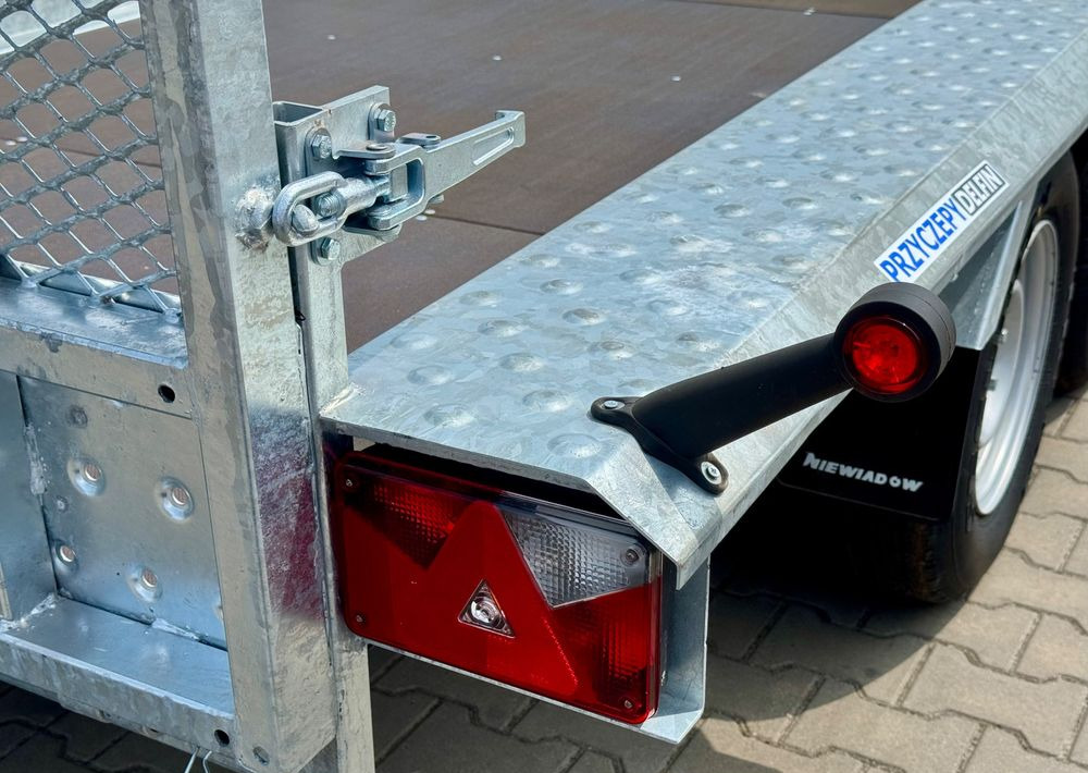 Jaunā Celtniecības tehnikas piekabe Niewiadów KN401835T - 400 x 185 cm | 2570kg ładowności | trap stalowy | 3-osiowa budowlanka: foto 7 Jaunā Celtniecības tehnikas piekabe Niewiadów KN401835T - 400 x 185 cm | 2570kg ładowności | trap stalowy | 3-osiowa budowlanka: foto 7