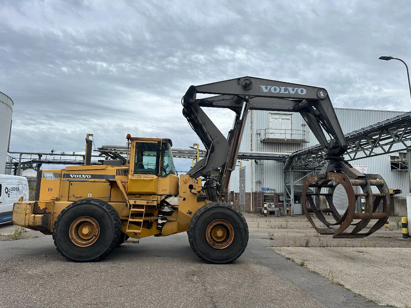 Volvo L180 C High Lift - Meža piekabe: foto 1 Volvo L180 C High Lift - Meža piekabe: foto 1