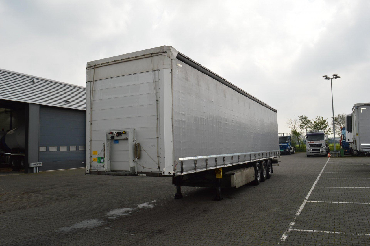 Schmitz Cargobull SCS24/L Lifting Axle - Tenta puspiekabe: foto 1 Schmitz Cargobull SCS24/L Lifting Axle - Tenta puspiekabe: foto 1