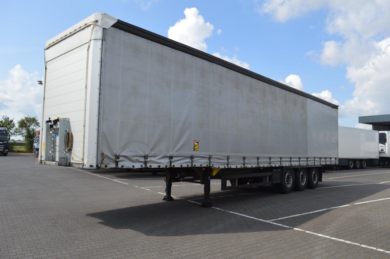 Schmitz Cargobull SCS24/L - Tenta puspiekabe: foto 1 Schmitz Cargobull SCS24/L - Tenta puspiekabe: foto 1