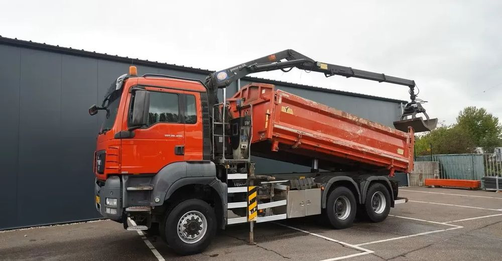 MAN TGS 28.400 / 6x6 / WYWROTKA 2-STRONNA Z HDS HMF 1643 Z2/ EURO 5 - Kravas automašīna pašizgāzējs: foto 1 MAN TGS 28.400 / 6x6 / WYWROTKA 2-STRONNA Z HDS HMF 1643 Z2/ EURO 5 - Kravas automašīna pašizgāzējs: foto 1