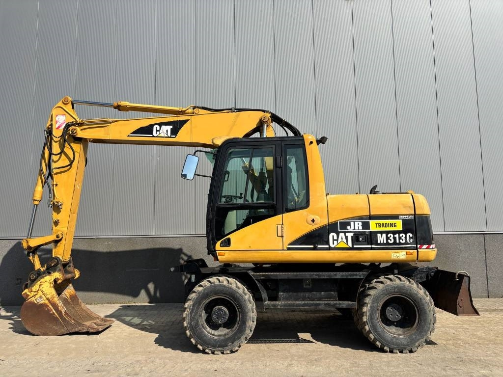 CAT M 313 C (Low verified hours) - Riteņu ekskavators: foto 1 CAT M 313 C (Low verified hours) - Riteņu ekskavators: foto 1