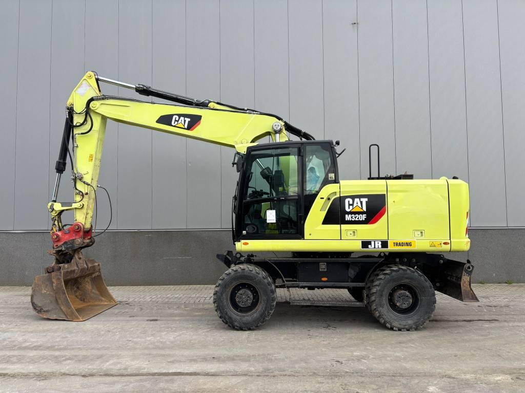CAT M 320 F - Riteņu ekskavators: foto 1 CAT M 320 F - Riteņu ekskavators: foto 1