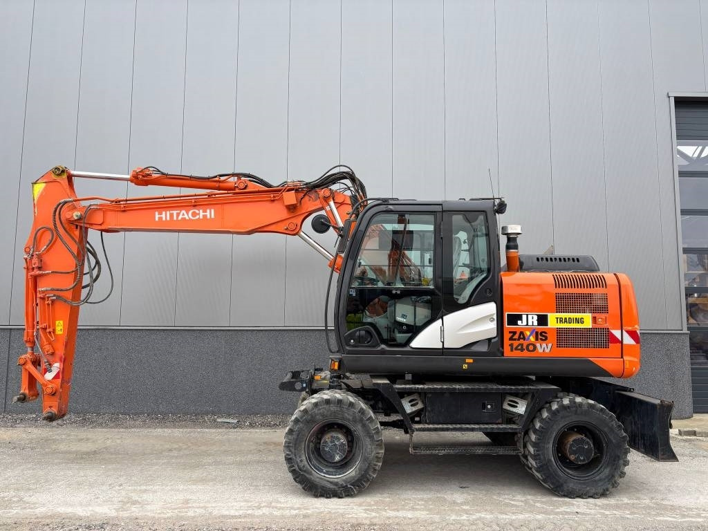 Hitachi ZX 140 W-5B - Riteņu ekskavators: foto 1 Hitachi ZX 140 W-5B - Riteņu ekskavators: foto 1